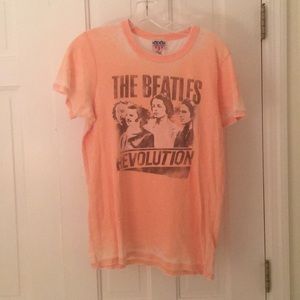 The Beatles “Revolution” orange/pink T-shirt.